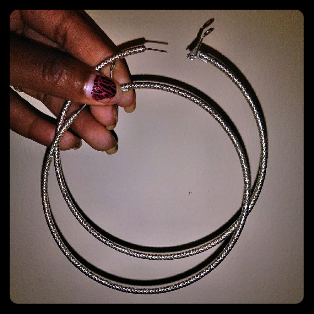 Big silver hoop earrings